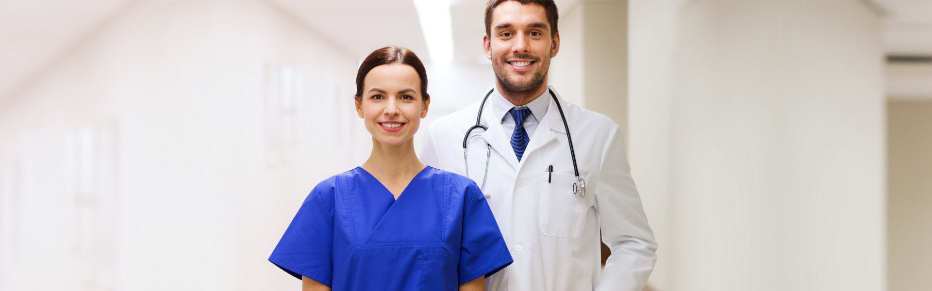 nurse and doctor looking at the camera